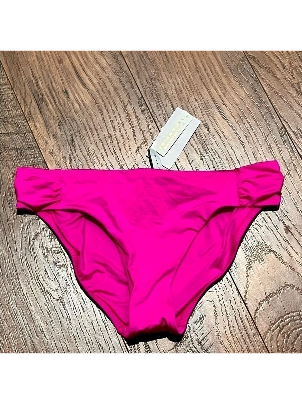 Trina TURK hot pink swim bottoms. Size 8